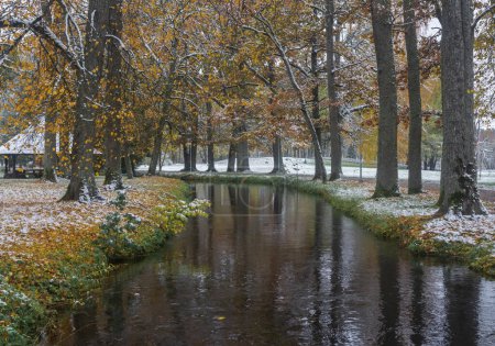 Photo for Autumn landscape with the first snow in the park. - Royalty Free Image