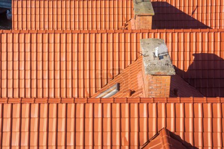 Photo for Orange clay tiles on top of a roof . - Royalty Free Image