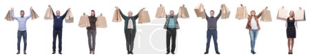 Photo for Collage of shoppers holding shopping bags high - Royalty Free Image
