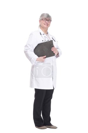 in full growth.confident female medic with clipboard looking at you. isolated on white background.