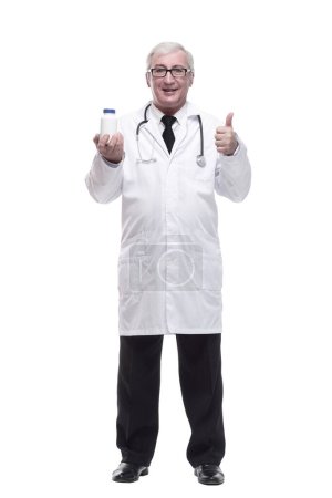 in full growth. qualified mature doctor with sanitizer in hand. isolated on a white background.glasses
