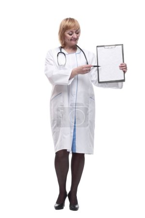 Photo for In full growth. friendly female doctor with a clipboard. isolated on a white background. - Royalty Free Image