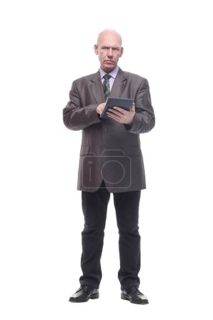 Photo for In full growth.business man with a calculator. isolated on a white background. - Royalty Free Image