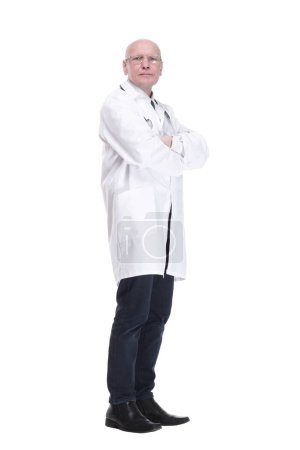 Photo for Side view.a serious doctor with a stethoscope looking at you . isolated on a white background. - Royalty Free Image