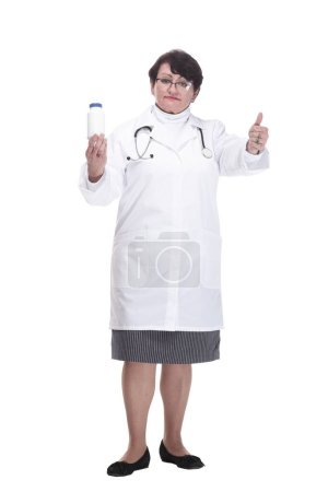 Photo for In full growth. senior female medic with sanitizer in hand. isolated on a white background. - Royalty Free Image