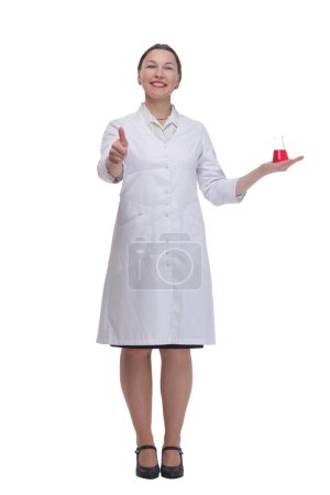 Photo for In full growth. medical woman with a laboratory flask. isolated on a white background. - Royalty Free Image