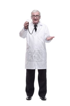 Photo for In full growth.friendly mature doctor with a stethoscope in hand. isolated on a white background. - Royalty Free Image