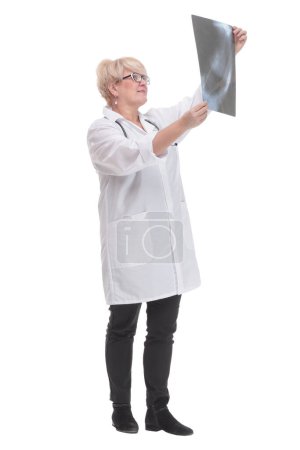Photo for In full growth. competent doctor with an x-ray. isolated on a white background. - Royalty Free Image