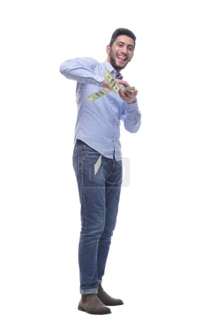 Foto de En pleno crecimiento. hombre alegre con billetes de banco. aislado sobre un fondo blanco. - Imagen libre de derechos