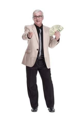 Photo for In full growth. happy intelligent man with banknotes. isolated on a white background. - Royalty Free Image