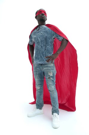 Photo for In full growth. confident guy in jeans and a superhero raincoat. photo with copy space - Royalty Free Image