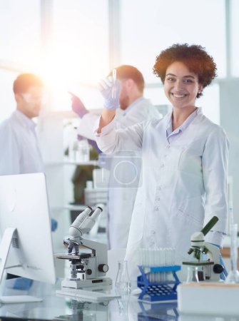 Photo for Scientists smiling together in lab - Royalty Free Image
