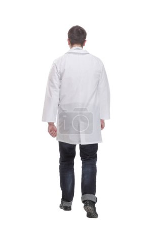 Photo for Young professional scientist man wearing white coat over isolated background standing backwards looking away and gestering with arms - Royalty Free Image