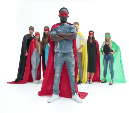 Photo for In full growth. stylish guy in a superhero Cape standing in front of his team - Royalty Free Image