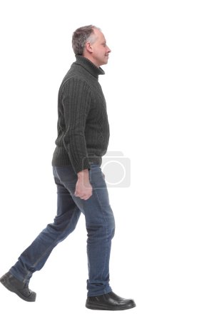 Foto de Vista trasera de un hombre guapo en jeans. Aislado sobre fondo blanco. - Imagen libre de derechos