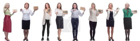 Téléchargez les photos : Group of happy people with gifts in their hands isolated on white background - en image libre de droit