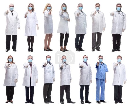Foto de Grupo de médicos en máscara aislados sobre fondo blanco - Imagen libre de derechos
