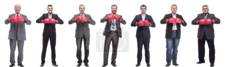 Foto de Collage de hombres de negocios en guantes de boxeo aislados sobre fondo blanco - Imagen libre de derechos