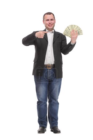 Foto de Un hombre de negocios sonriente en jeans con dinero en dólares mostrando los pulgares hacia arriba. Negocios, personas, finanzas y concepto de éxito - Imagen libre de derechos