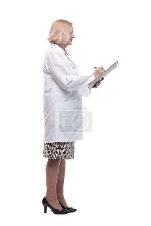 full-length. female doctor with clipboard. isolated on a white background.