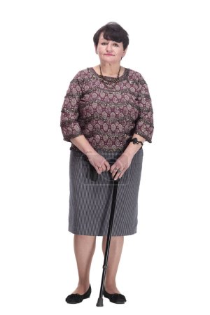 Photo for Full-length. casual elderly woman with a walking stick. isolated on a white background. - Royalty Free Image