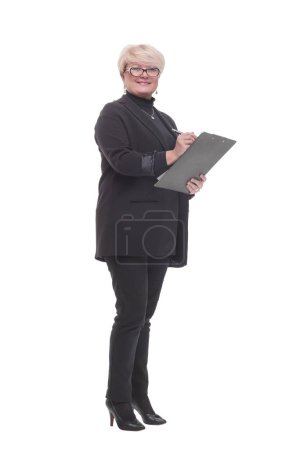 Foto de En pleno crecimiento. Mujer ejecutiva con portapapeles. aislado sobre un fondo blanco. - Imagen libre de derechos