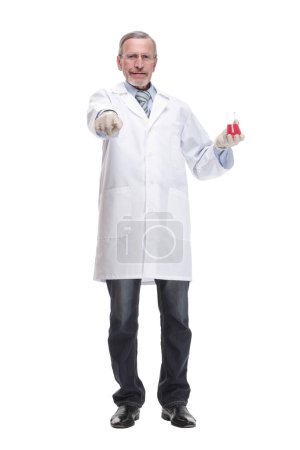 Photo for Mature scientist with grey hair and beard in white coat standing with beaker in his hand and holding medical test isolated on white background - Royalty Free Image