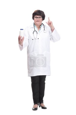 Photo for In full growth. senior female doctor with sanitizer in hand . isolated on a white background. - Royalty Free Image
