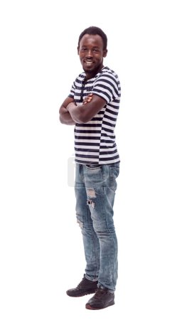 Foto de En pleno crecimiento. un joven sonriente con una camiseta a rayas. aislado en blanco - Imagen libre de derechos