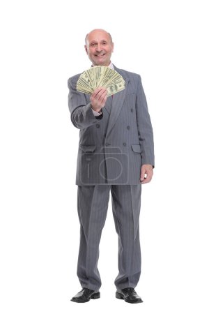Photo for Smiling senior gentleman holding money, isolated on white background looking at camera - Royalty Free Image