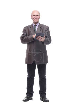 Foto de En pleno crecimiento.hombre de negocios con una calculadora. aislado sobre un fondo blanco. - Imagen libre de derechos