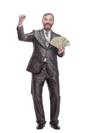 Photo for In full growth. happy business man with dollar bills. isolated on a white background. - Royalty Free Image