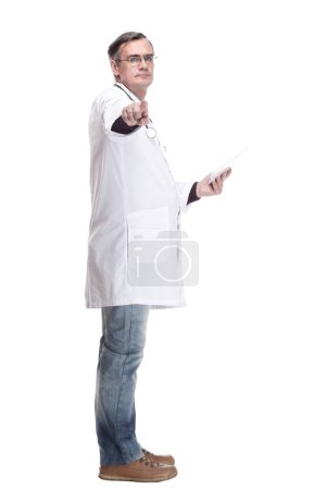 Photo for In full growth.qualified doctor with a digital tablet. isolated on a white background. - Royalty Free Image