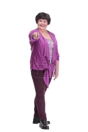 Téléchargez les photos : Full-length.casual femme âgée dans un chemisier violet. isolé sur un fond blanc. - en image libre de droit