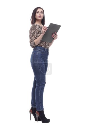 Photo for In full growth. Executive young woman with clipboard. isolated on a white background. - Royalty Free Image