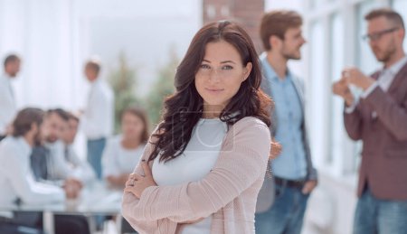 Photo for Executive young woman standing in modern office. photo with copy space - Royalty Free Image