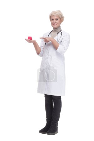 Photo for In full growth. female doctor with a laboratory flask . isolated on a white background. - Royalty Free Image