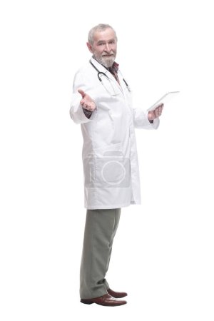 Photo for Elderly competent doctor with a digital tablet. isolated on a white background. - Royalty Free Image