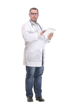 Photo for Smiling doctor with tablet computer isolated over white background. Concept of health care. - Royalty Free Image