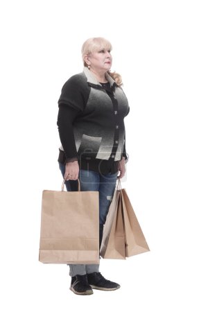 Photo for Full-length. casual woman in jeans with shopping bags. isolated on a white background. - Royalty Free Image