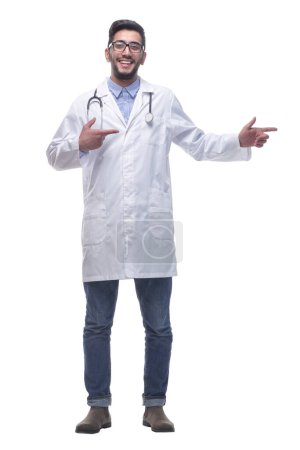 Photo for In full growth. thoughtful doctor looking at a white blank screen . isolated on white background. - Royalty Free Image