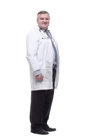 Photo for In full growth. competent doctor in a white coat. isolated on a white background. - Royalty Free Image