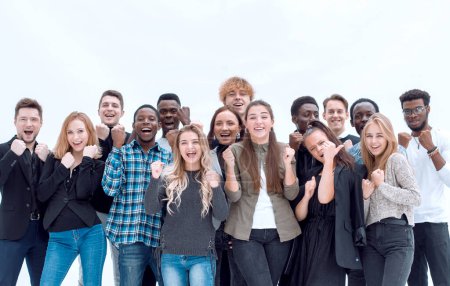 full length . a group of happy young people standing together . isolated on a white