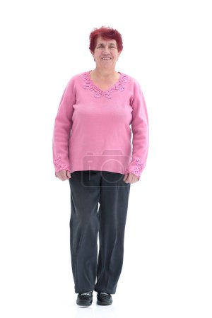 Photo for Confident older woman walks forward. isolated on a white background - Royalty Free Image