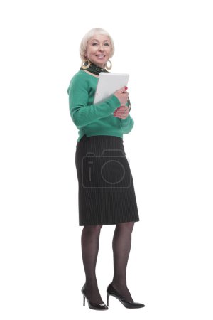 Téléchargez les photos : En pleine croissance. femme attrayante avec une tablette numérique. isolé sur un fond blanc. - en image libre de droit