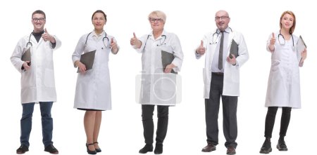 Photo for Full length group of doctors with notepad isolated on white background - Royalty Free Image