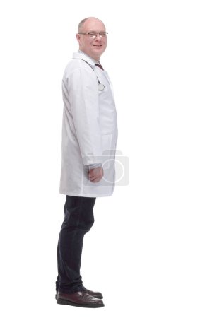 Photo for In full growth. qualified mature doctor in a white coat .isolated on a white background. - Royalty Free Image
