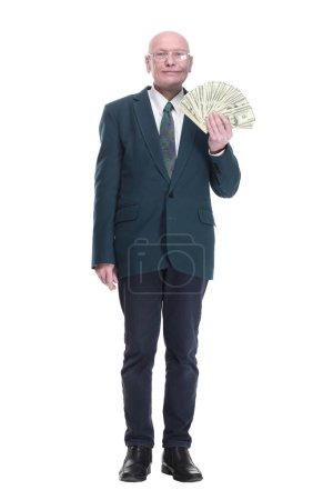 Photo for Side view. personable business man with a wad of dollar bills. isolated on a white background. - Royalty Free Image