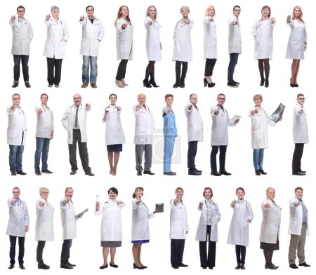 Photo for Group of doctors in full length isolated on white background - Royalty Free Image