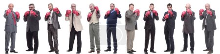 Foto de Collage de hombres de negocios en guantes de boxeo aislados sobre fondo blanco - Imagen libre de derechos